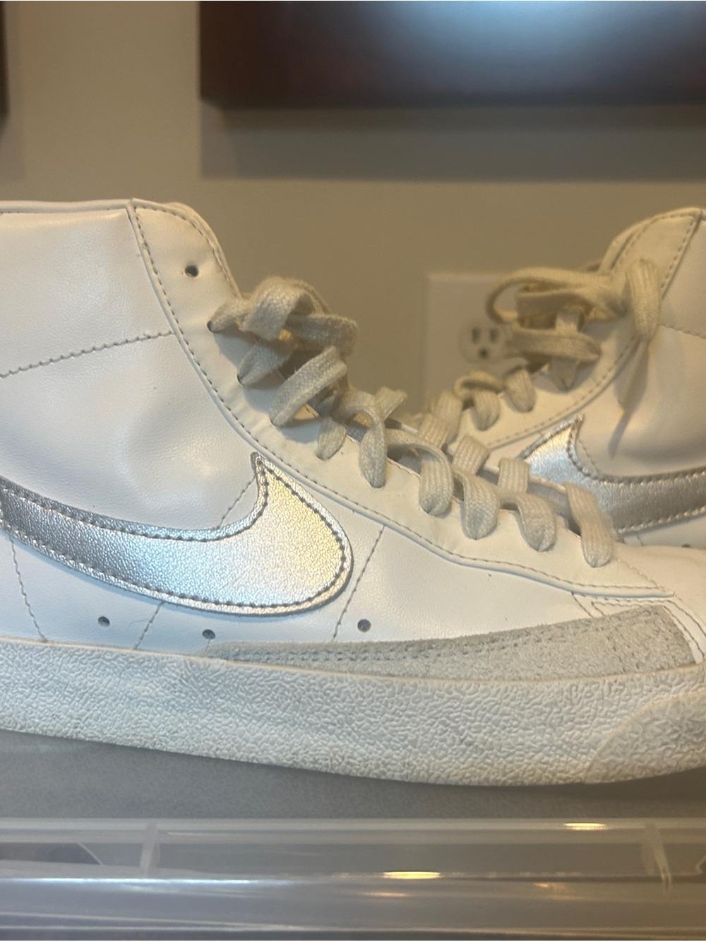 Nike Women White High-Top Sneakers with Silver Swoosh